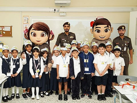 GDRFA officials meets Dubai students with Salem and Salama.