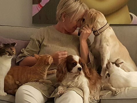 Dutch expat Trudy Brusselman with some of her pets: Her pride and joy.