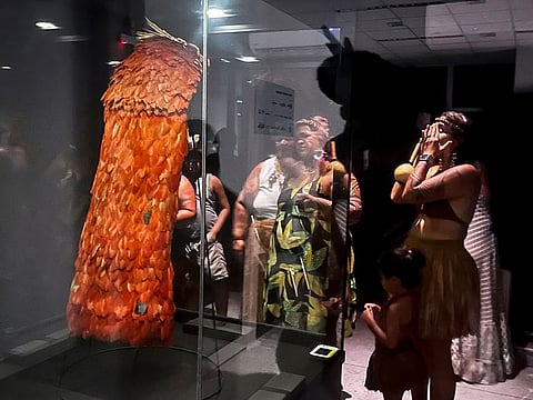Members of the Tupinamba Indigenous people visit the Tupinamba cloak returned by the National Museum of Denmark at the Quinta de Boa Vista Park in Rio de Janeiro, Brazil, on September 11, 2024.