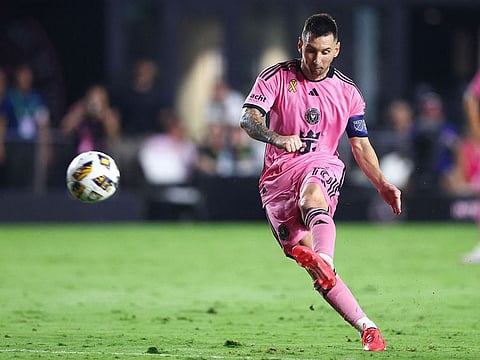 Lionel Messi #10 of Inter Miami kicks a free kick against the Philadelphia Union during the second half of the game at Chase Stadium.
