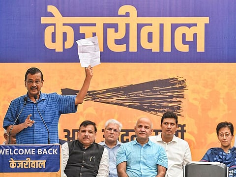 Delhi Chief Minister and Aam Aadmi Party (AAP) national convener Arvind Kejriwal addresses party supporters, in the presence of party leader Manish Sisodia, at the party office, in New Delhi on Sunday, September 15,  2024.