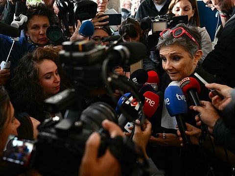 Beatrice Zavarro (R), lawyer of Dominique Pelicot, speaks to the press at the Avignon courthouse during the trial of Gisele Pelicot's former partner who is accused of drugging her for nearly ten years and inviting strangers to rape her at their home in Mazan, a small town in the south of France, in Avignon, on September 17, 2024.
