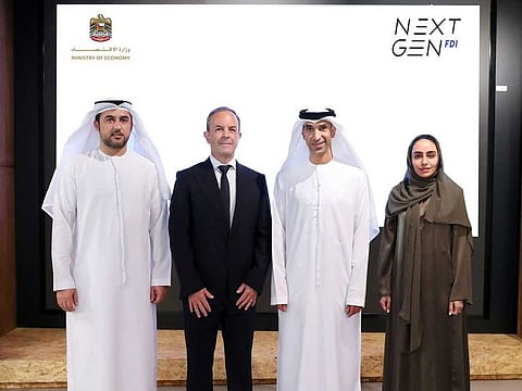 Dr Thani Al Zeyoudi, Minister of State for Foreign Trade, and Mark Firth, Chief Executive Officer of VeraViews, along with others.