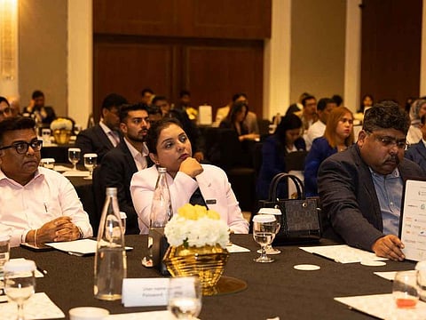 Attendees listening to industry experts during a panel discussion at Gulf News' Invest UAE seminar in June