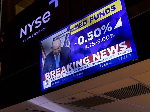 A television station broadcasts the Federal Reserve's interest-rate cut on the floor of the New York Stock Exchange (NYSE) in New York, US, on Wednesday, Sept. 18, 2024. The Federal Reserve lowered its benchmark interest rate by a half percentage point Wednesday, in an aggressive start to a policy shift aimed at bolstering the US labor market.