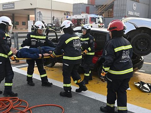 Dubai Police's first female rescue team demonstrating their skills at their graduation ceremony.