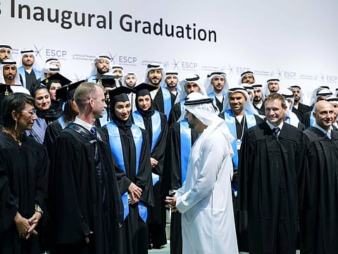 Sheikh Hamdan bin Mohammed bin Rashid Al Maktoum interacting with graduates at a ceremony in Dubai on Thursday.