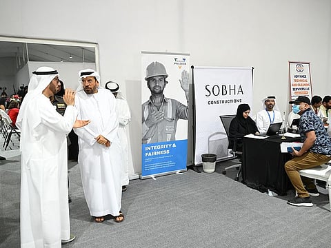 (Left) Lieutenant General Mohammed Ahmed Al Marri, Director General of GDRFA, talking to Abdullah Rasheed, Gulf News Editor in Abu Dhabi, during a visit to Al Aweer Centre in Dubai. Al Marri explained about services offered to Amnesty seekers at the centre.
