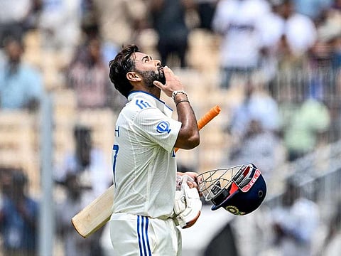 India's Rishabh Pant gestures as he walks back to the pavilion after his dismissal during the third day of the first Test cricket match between India and Bangladesh at the M.A. Chidambaram Stadium in Chennai on September 21, 2024.