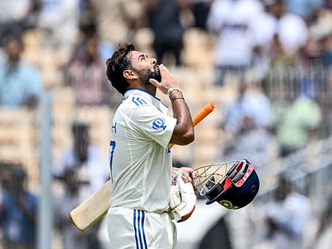 India's Rishabh Pant gestures as he walks back to the pavilion after his dismissal during the third day of the first Test cricket match against Bangladesh at the M.A. Chidambaram Stadium in Chennai.