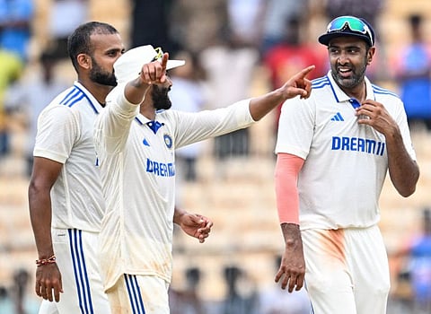 India's Ravichandran Ashwin (right) walks back with teammates Ravindra Jadeja (centre) and Akash Deep after their team's win at the end of the first Test cricket match against Bangladesh at the M.A. Chidambaram Stadium in Chennai on Sunday.