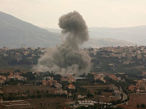 Smoke billows from the site of an Israeli airstrike on Lebanon's southern village of Khiam on September 23, 2024.