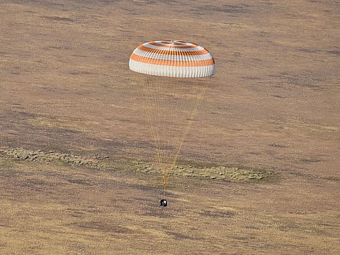 In this handout photograph released by NASA and taken on September 23, 2024 shows the Soyuz MS-25 spacecraft with Expedition 71 NASA astronaut Tracy C. Dyson and Russian cosmonauts Nikolai Chub and Oleg Kononenko before landing in a remote area near the town of Zhezkazgan, Kazakhstan.