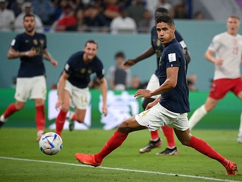 France's defender Raphael Varane in action during the Qatar 2022 World Cup Group D football match against Denmark at Stadium 974 in Doha on November 26, 2022.