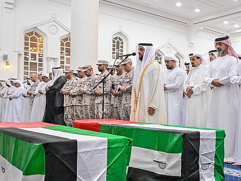 His Highness Sheikh Humaid bin Rashid Al Nuaimi, Supreme Council Member and Ruler of Ajman, and Sheikh Ammar bin Humaid Al Nuaimi, Crown Prince of Ajman and Chairman of the Executive Council, at the funeral prayer at Sheikh Zayed Mosque in Al Jurf area in Ajman