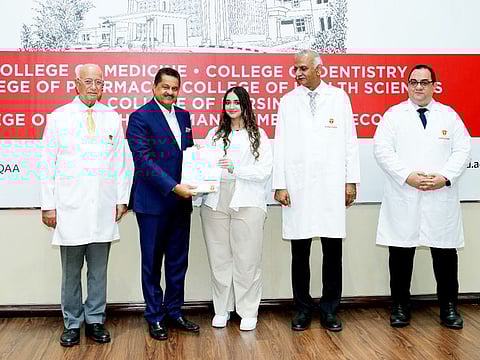 Dr Thumbay Moideen (2nd from L) during the Gulf Medical University's white coat ceremony in Ajman.