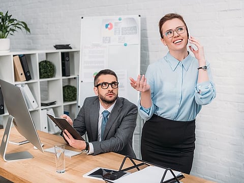 When dealing with an irritating co-worker, it's essential to maintain a polite yet firm demeanour while clearly setting boundaries.