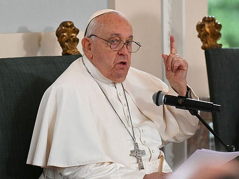 Pope Francis delivers a speech next to King Philippe of Belgium (unseen) and Queen Mathilde of Belgium (unseen) at the Castle of Laeken, near Brussels, on September 27, 2024, at the start of a visit to Belgium.