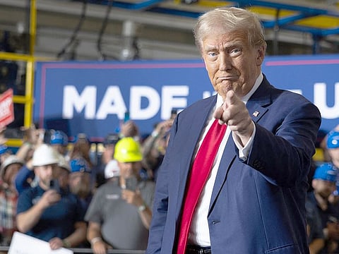 Republican presidential candidate, former President Donald Trump arrives for a campaign event at the Falk Productions manufacturing facility on September 27, 2024 in Walker, Michigan.