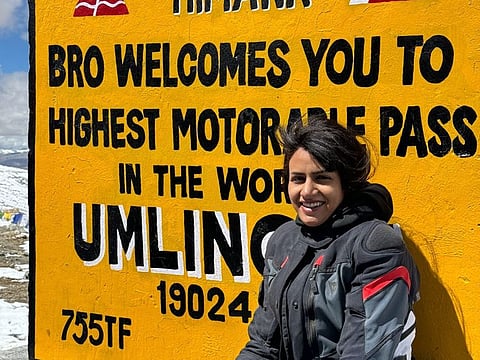 Emirati woman biker Nora AlJassasi at India's Umling La, the highest motorable pass in the world.