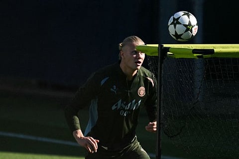 Manchester City's Norwegian striker Erling Haaland takes part in a team training session at Manchester City's training ground, in Manchester, north-west England, on September 17.