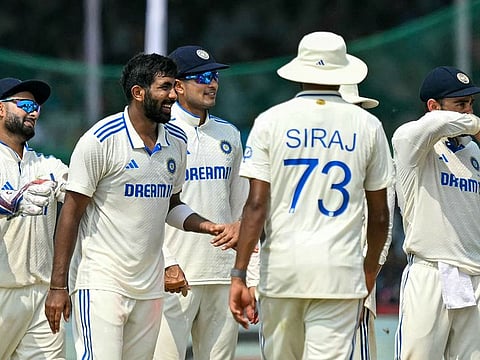 Indian players celebrate the wicket of Bangladesh's Taijul Islam during the fifth and final day of the second Test at Kanpur on Tuesday.