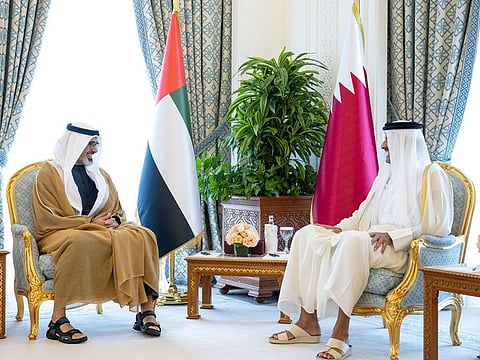 Sheikh Tamim bin Hamad Al Thani, Emir of Qatar, with Sheikh Khaled bin Mohamed bin Zayed Al Nahyan, Crown Prince of Abu Dhabi, at the Amiri Diwan in Doha on Tuesday