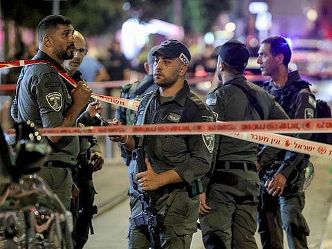 Israeli border guards deploy at the scene of a shooting attack outside al-Nuzha mosque along Jersalem Boulevard in Jaffa south of Tel Aviv on October 1, 2024.
