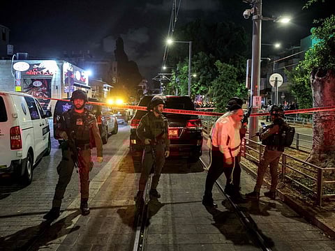 Israeli border guards deploy at the scene of a shooting attack near the Ehrlich station of the Tel Aviv Light Rail in Jaffa south of Tel Aviv on October 1, 2024.