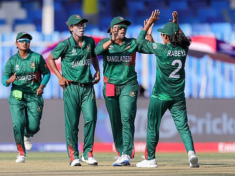 Bangladesh players celebrate the wicket of Saskia Horley of Scotland in the opening match of Women's T20 World Cup at Sharjah Stadium on Thursday.