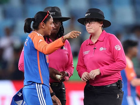 Indian captain Harmanpreet Kaur discussing with Jacqueline Williams and Anna Harris after the umpires deemed the Amelia Kerr runout invalid, in the Group A game against New Zealand in Dubai on October 4, 2024.