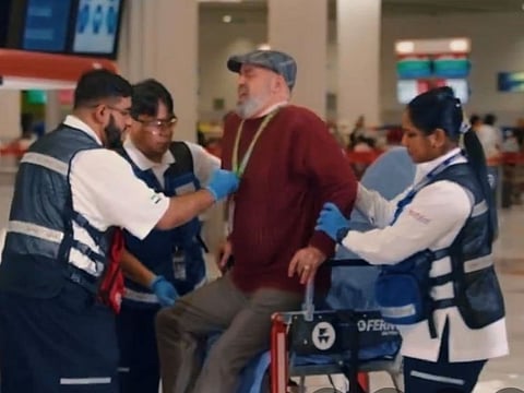 Dubai Airports staff quick to help an elderly man on to a wheelchair during his passage through DXB.