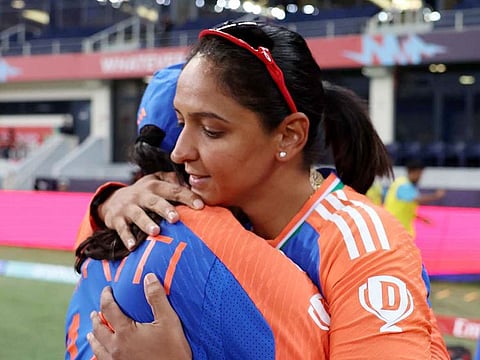 Indian captain Harmanpreet Kaur (right) hugs Smriti Mandhan after the victory over Sri Lanka in the Women’s T20 World Cup game at the Dubai International Cricket Stadium on October 9, 2024. The win helped boost India’s semifinal hopes.