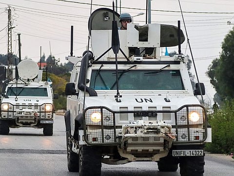 Vehicles of the United Nations Interim Force in Lebanon (UNIFIL) patrol in Marjeyoun in southern Lebanon on October 11, 2024, amid the ongoing war between Hezbollah and Israel.