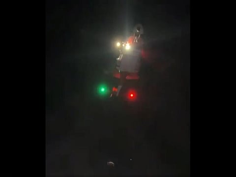 Still from police video showing the helicopter during the rescue