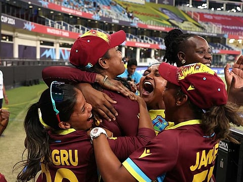 West Indies players celebrate after their win over England in the Women's T20 World Cup at the Dubai International Cricket Stadium on Tuesday.