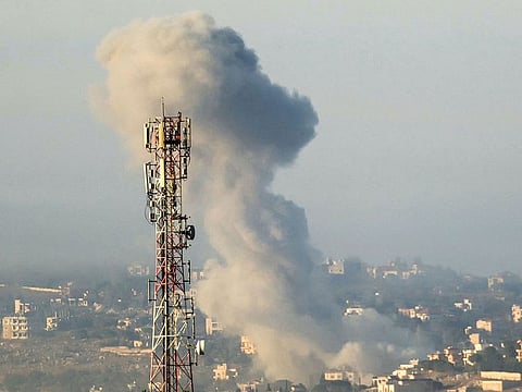 Smoke billows from the site of an Israeli air strike on the village of Taybeh in southern Lebanon on October 15, 2024.