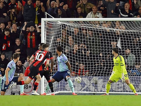 Bournemouth's midfielder Ryan Christie scores his team's first goal during the English Premier League football match against Arsenal at the Vitality Stadium in Bournemouth, southern England on October 19, 2024.