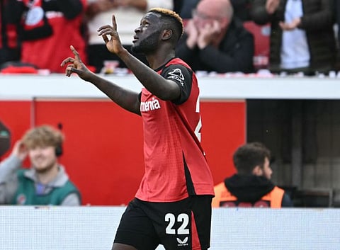 Bayer Leverkusen's Nigerian forward Victor Boniface celebrates scoring during the German first division Bundesliga football match against Eintracht Frankfurt in Leverkusen on October 19.