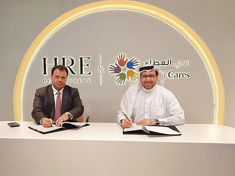 (R) Dr Tariq Al Gurg, CEO and Vice-Chairman of Dubai Cares and Mohamed Adib Hijazi, Chairman, HRE Development during the signing ceremony