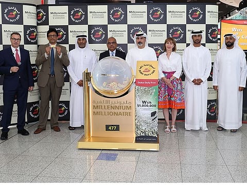 Officials during the Dubai Duty Free Millennium Millionaire draw at the Dubai airport on Wednesday, October 23.