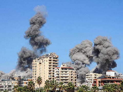 Smoke plumes erupt following an Israeli air strike on a neighbourhood of Lebanon's southern city of Tyre.