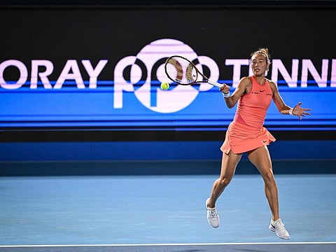 China's Zheng Qinwen hits a return to Japan's Moyuka Uchijima during their women's singles match at on day four of the Pan Pacific Open tennis tournament in Tokyo on Thursday.