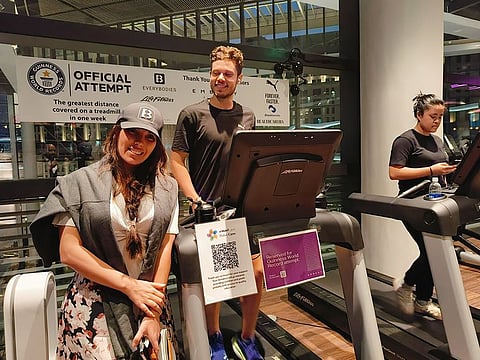 British expat in Dubai Evren Ozka with his wife Berna Subasi during his treadmill run record breaking attempt,