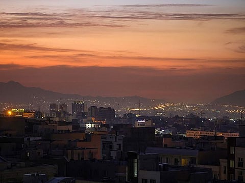Part of the city skyline is pictured at dawn after several explosions were heard in Tehran on October 26, 2024.