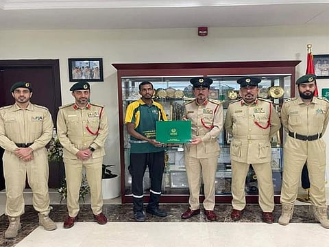 Brigadier Majid Al Suwaidi presented Swadesh Kumar with an award, praising his actions as a model of integrity and responsibility.