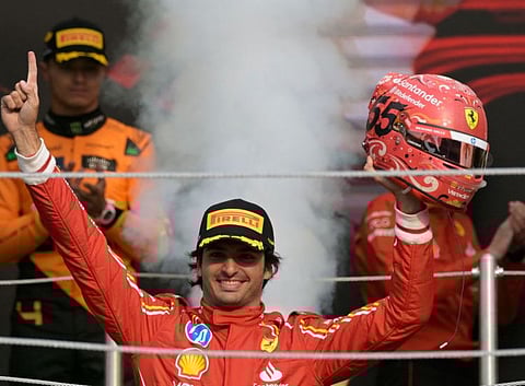 Ferrari's Carlos Sainz celebrates in the podium after winning the Mexico City Grand Prix at the Hermanos Rodriguez racetrack, in Mexico City on Sunday.