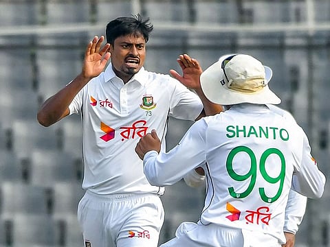 Bangladesh's Taijul Islam (left) celebrates with captain Najmul Hossain Shanto during the first Test against South Africa. The spinner is confident of hosts coming back strongly in the second Test.