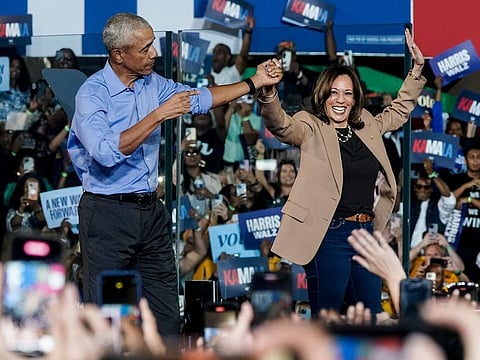 US Vice President Kamala Harris, right, and former US President Barack Obama during a campaign event in Clarkston, Georgia, US, on Thursday, Oct. 24, 2024.