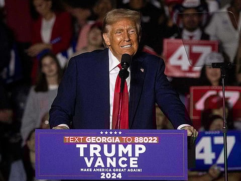 Former US President and Republican presidential candidate Donald Trump speaks during a campaign rally at the McCamish Pavilion in Atlanta, Georgia, October 28, 2024.